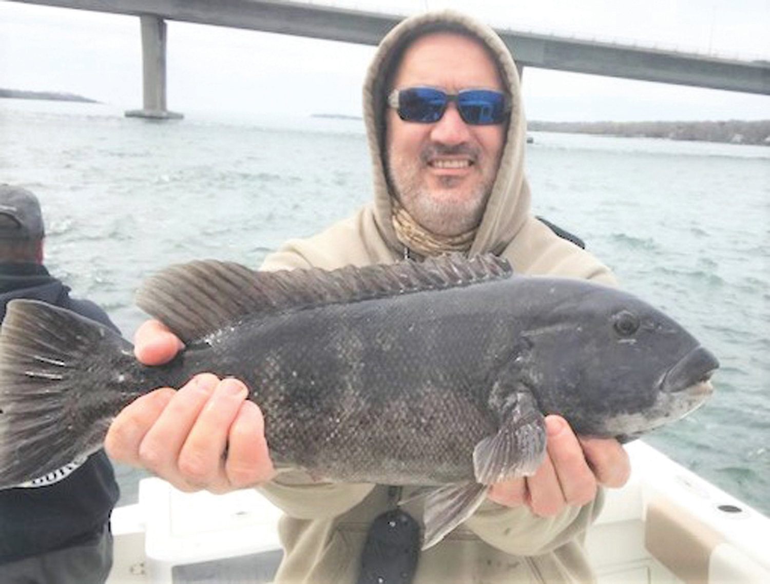 Tautog bite strong: The tautog bite remains strong in the Bay and along the coastal shore. Derek Kolodziejczak with a tautog caught this week near the Jamestown Bridge.